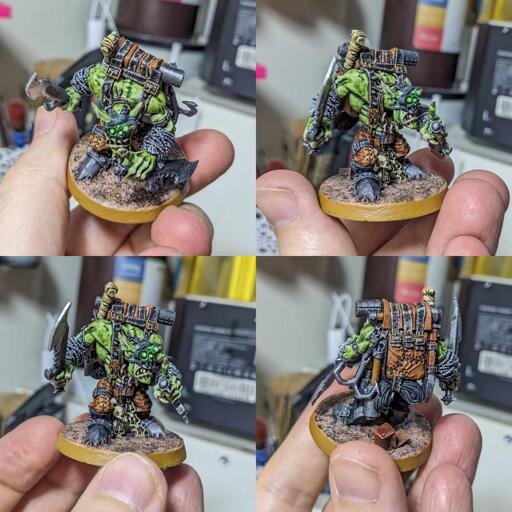 Four shots of the same model, the Brian Nelson version of the Ork Kommando, Boss Snikrot, painted to a middling standard